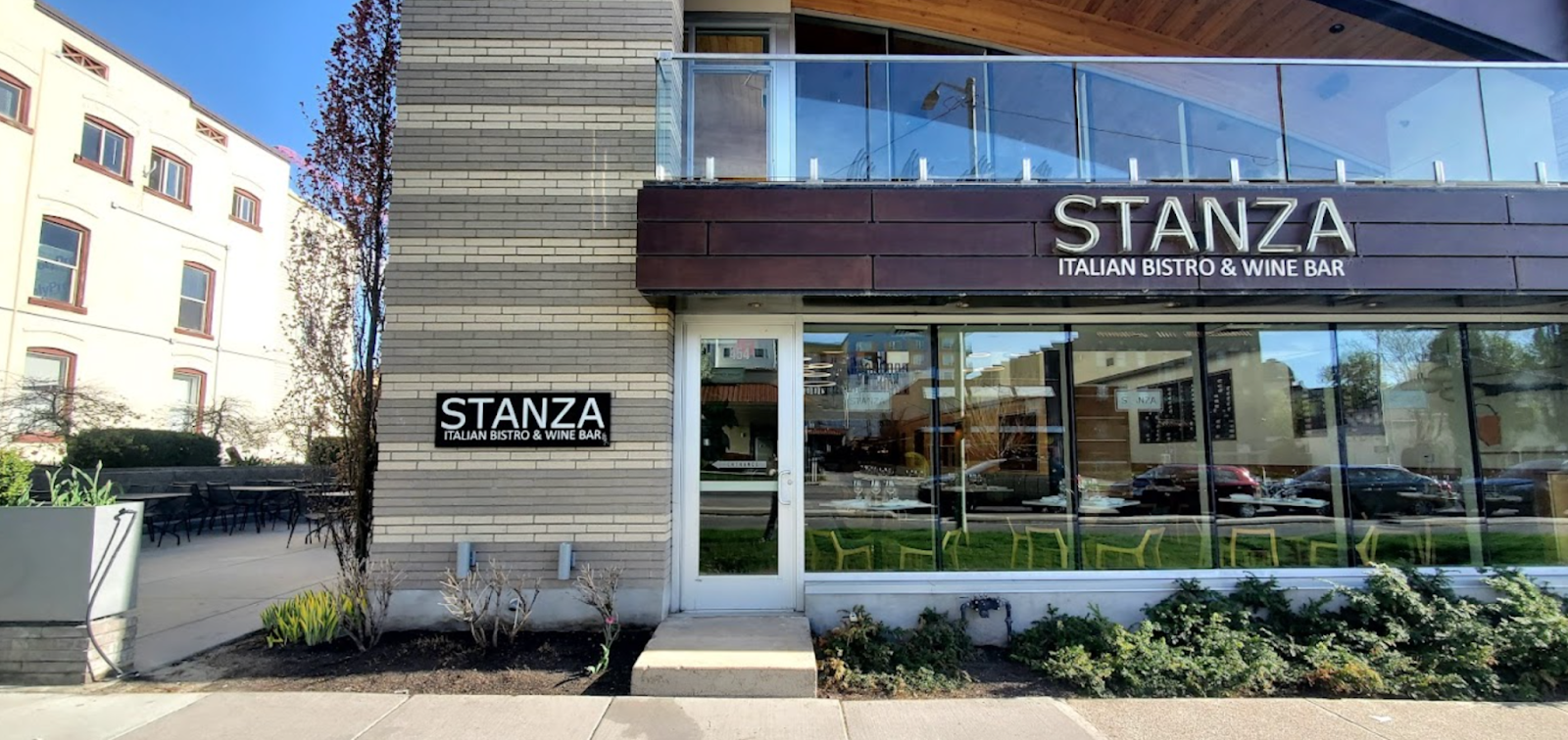 Front facade of the two story restaurant Stanza, an Italian bistro and wine bar.